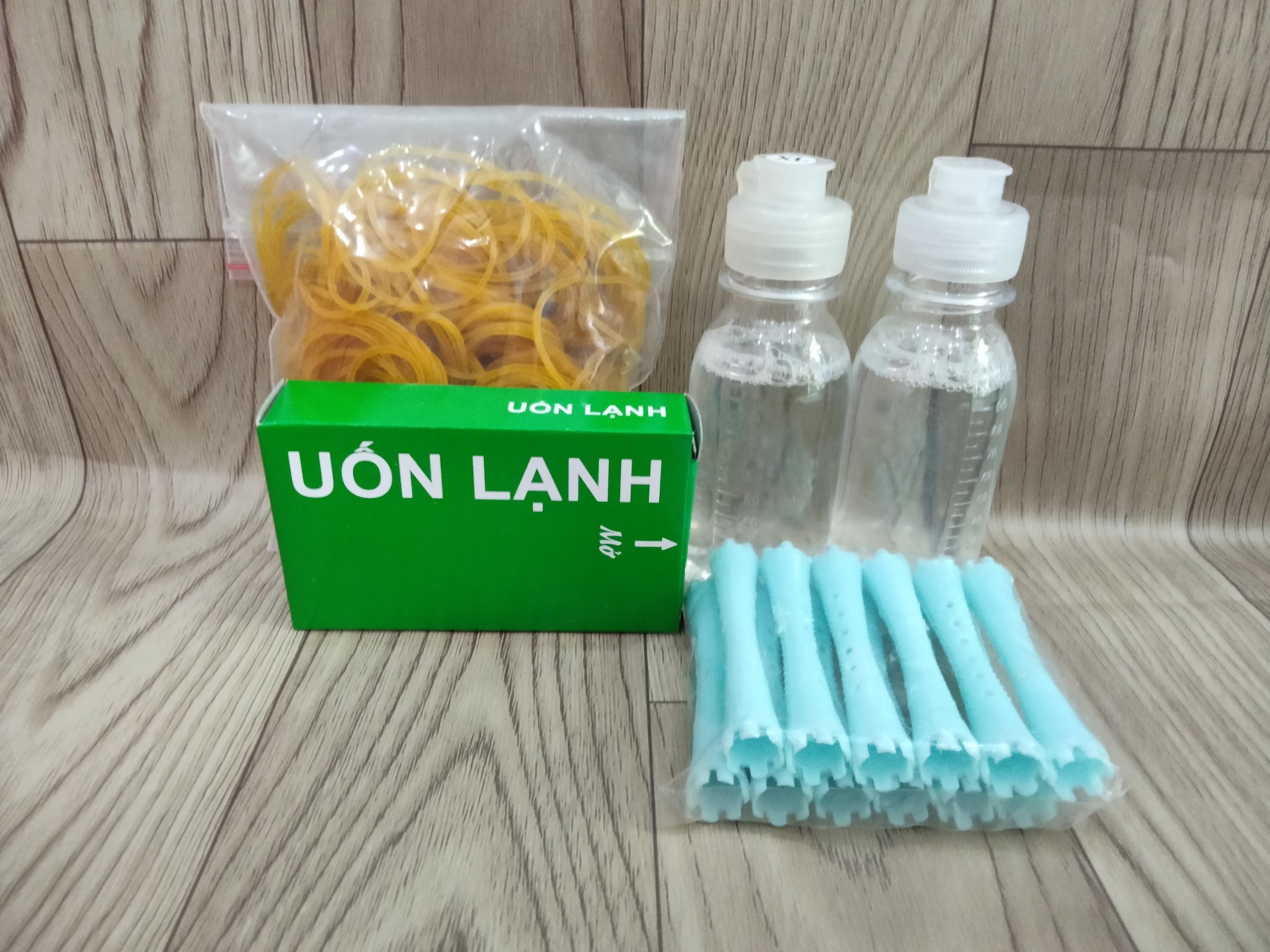 Combo uốn: Cặp uốn lạnh 100ml, 12 truc uốn số 2, thun cột, giấy uốn lạnh