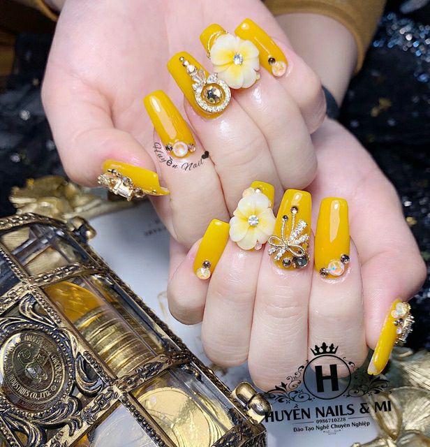 Charm Nơ Quốc Dân Cao Cấp Kim Loại