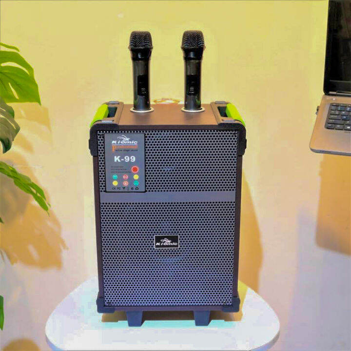 [DEAL SALE HOT] Loa Kẹo Kéo Di Động Hát Karaoke Giá Rẻ, Loa Kéo KIOMIC K99 - Tặng 2 Micro Không Dây - Công Suất Khủng - Loa Thùng Gỗ Sang Trọng, Chất Liệu Chắc Chắn, Bền Bỉ, Đầy Đủ Kết Nối Bluetooth, AV, USB, SD Card - Âm Thanh Cực Chuẩn