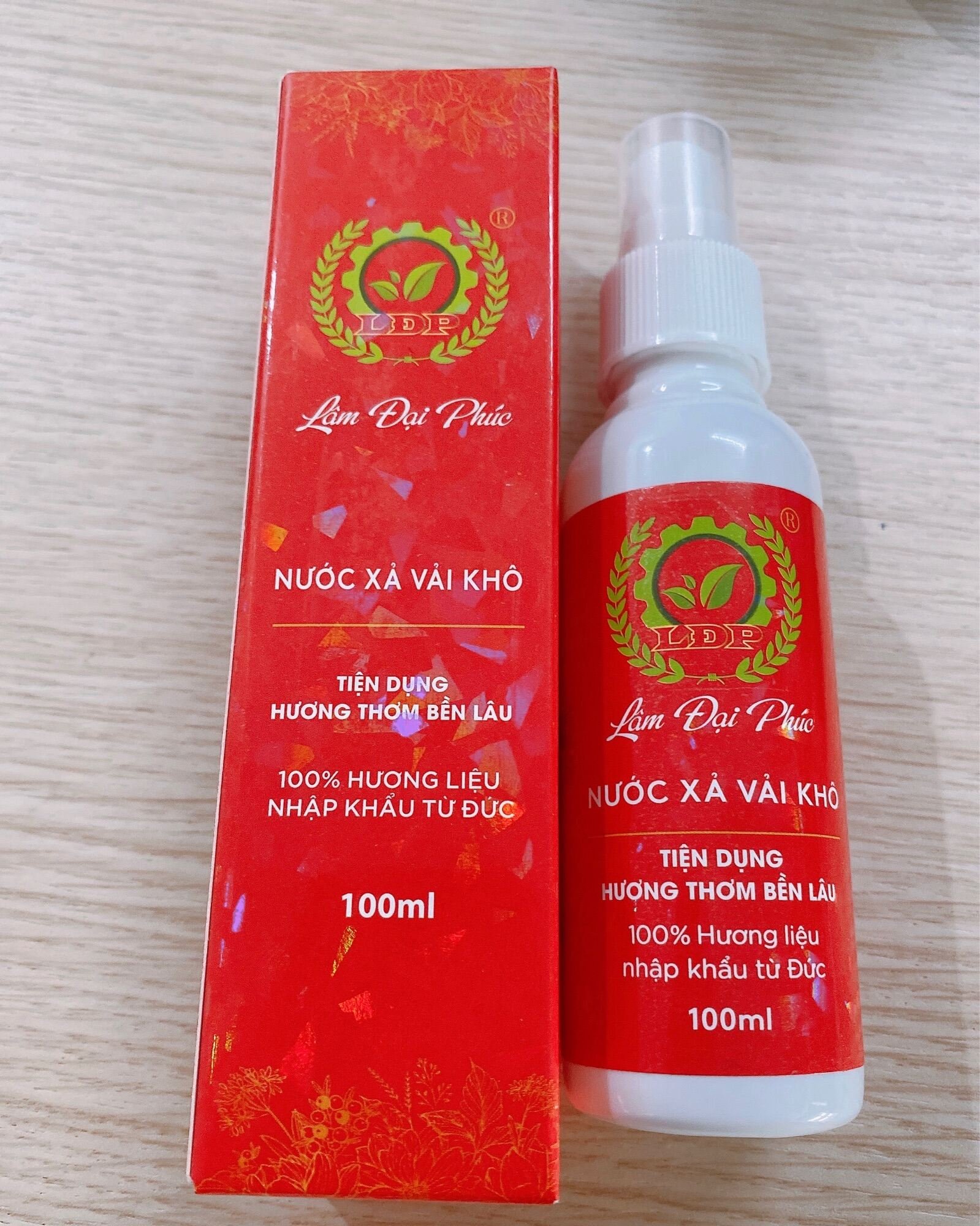 Xịt xả vải khô Lâm Đại Phúc ( chai màu đỏ )