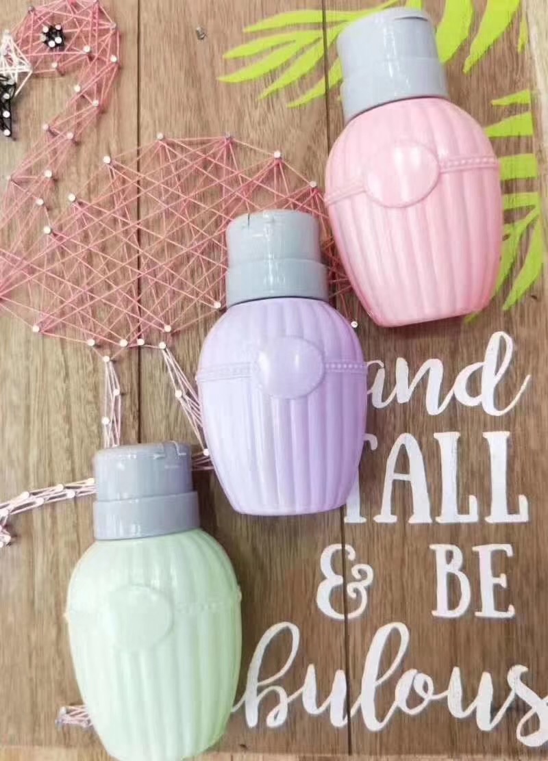 Chai đựng dung dịch tròn khác có lò so bơm