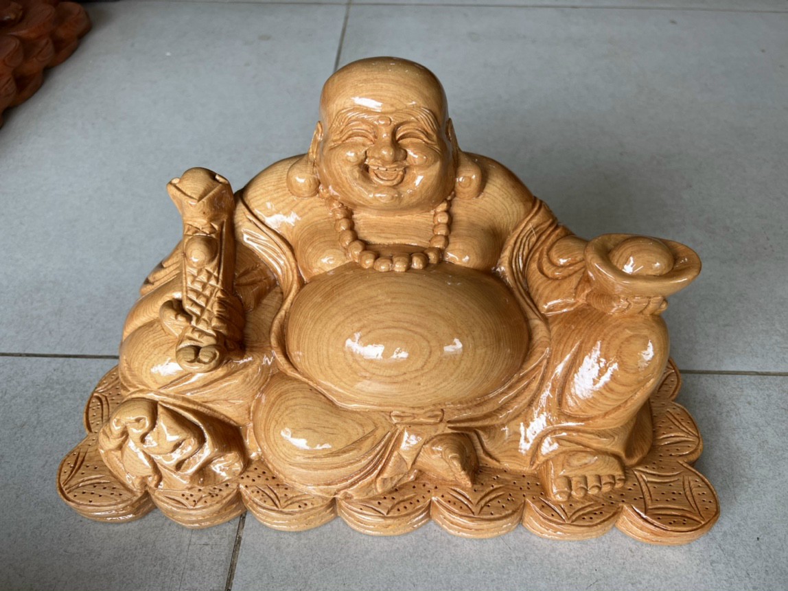 Tượng phật di lặc ngồi gỗ pomu ngang 35cm