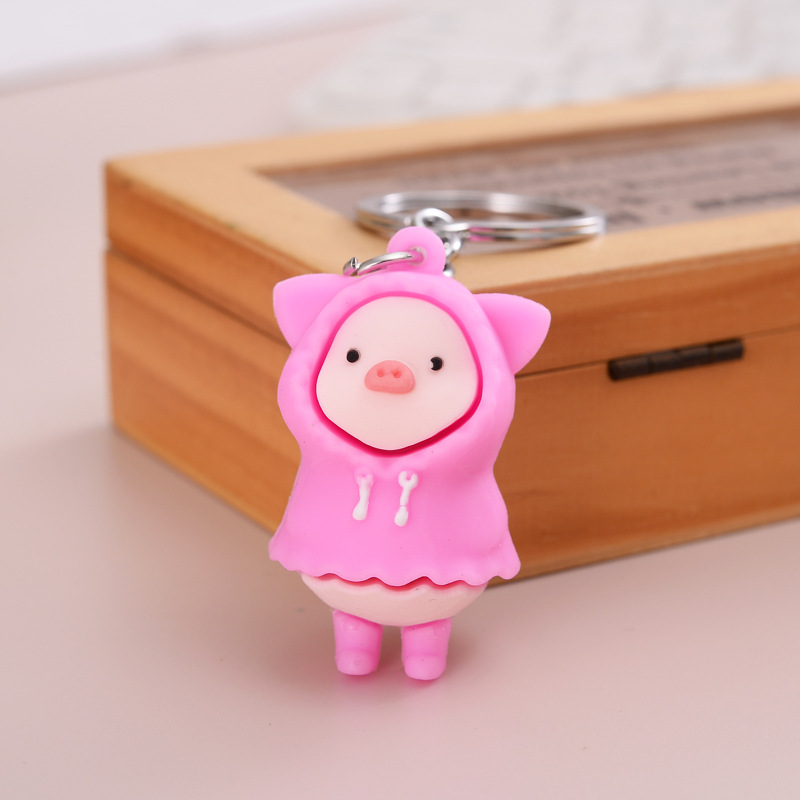 Móc khóa heo con mặc áo mưa cute