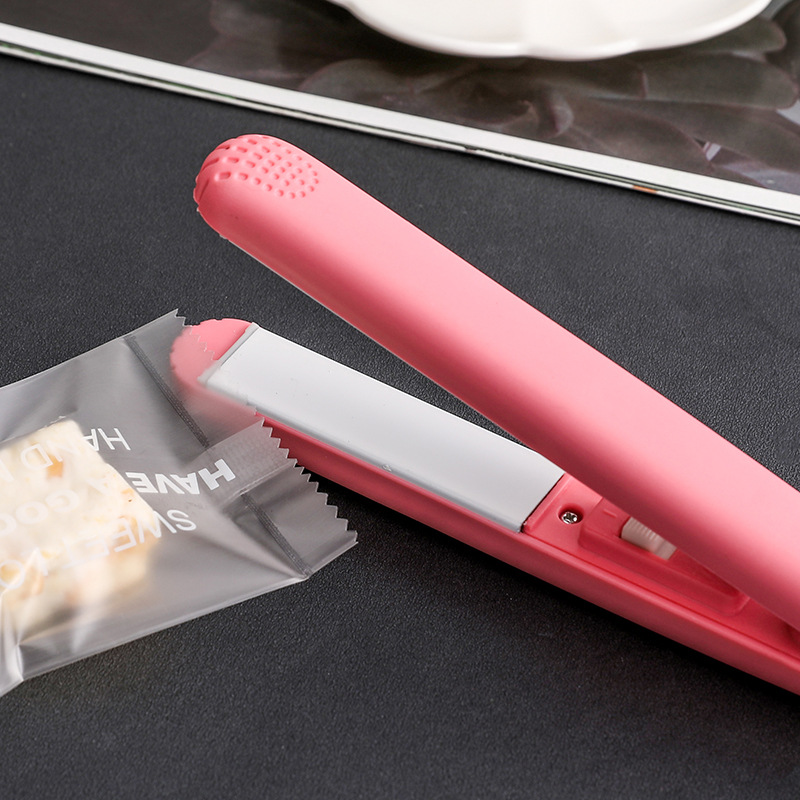 Máy hàn miệng túi mini cầm tay tiện lợi, đóng túi kẹo bánh, máy dập kẹo nougat - LOKING