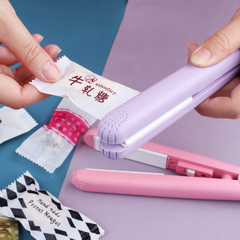 Máy hàn miệng túi kẹo nougat, Máy ép tóc mini dạng phẳng