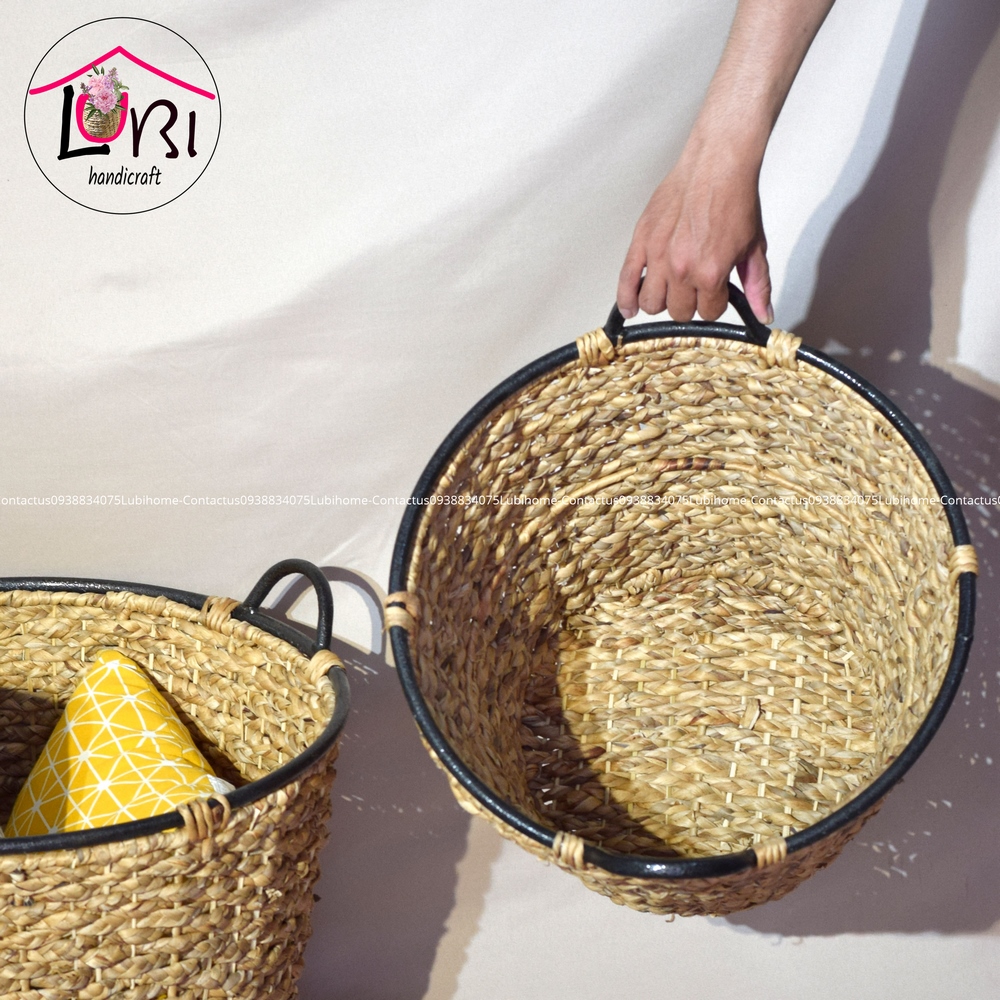 Round water hyacinth baskets with vintage iron handles