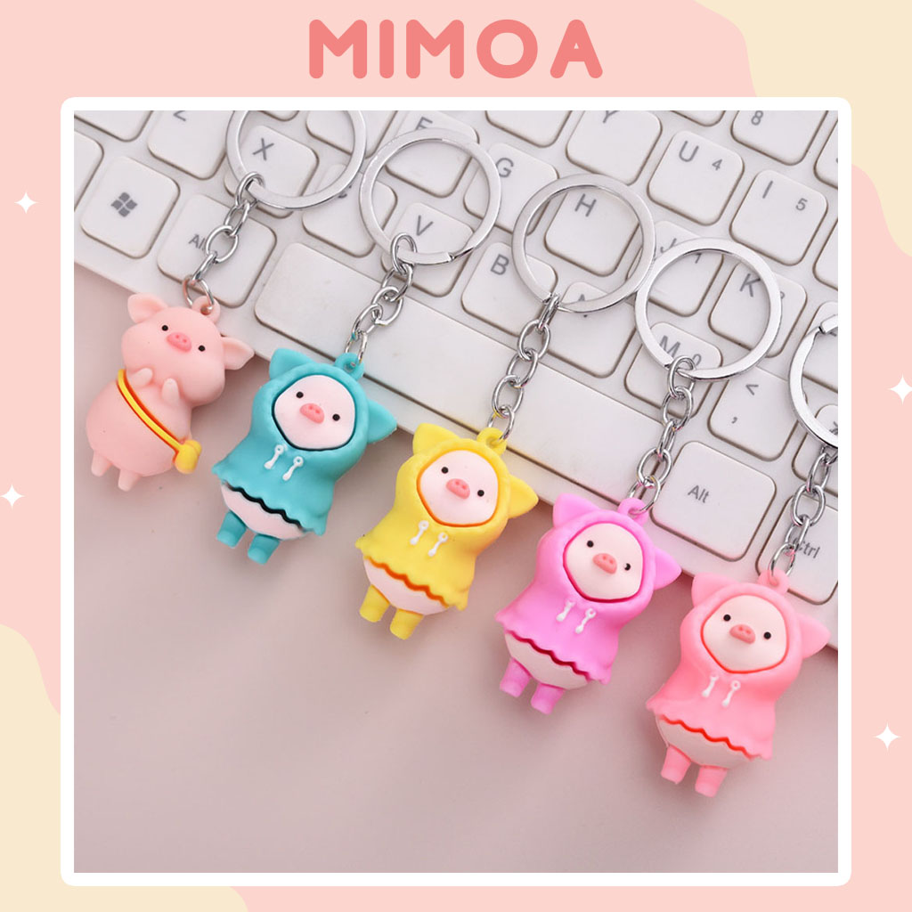 Móc khóa heo con mặc áo mưa cute
