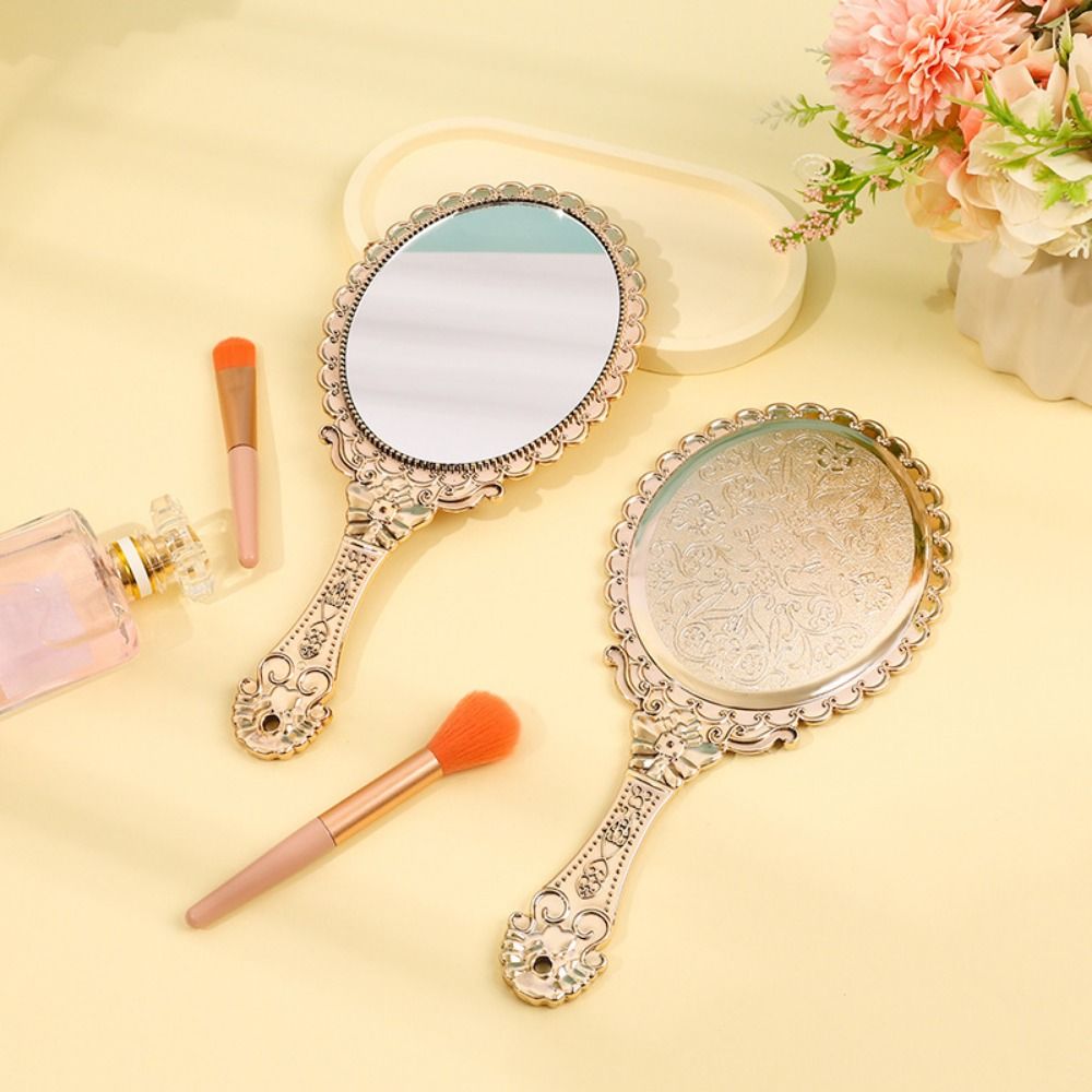 Creative High Definition Handheld Mirror Pattern Handle Easy to Carry Carved Small Mirror Odorless Portable Dressing Mirror Living Room. 