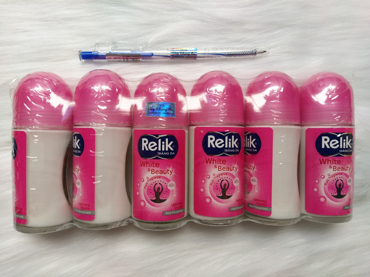 2 chai Lăn khử mùi Relik hồng chai 50ml