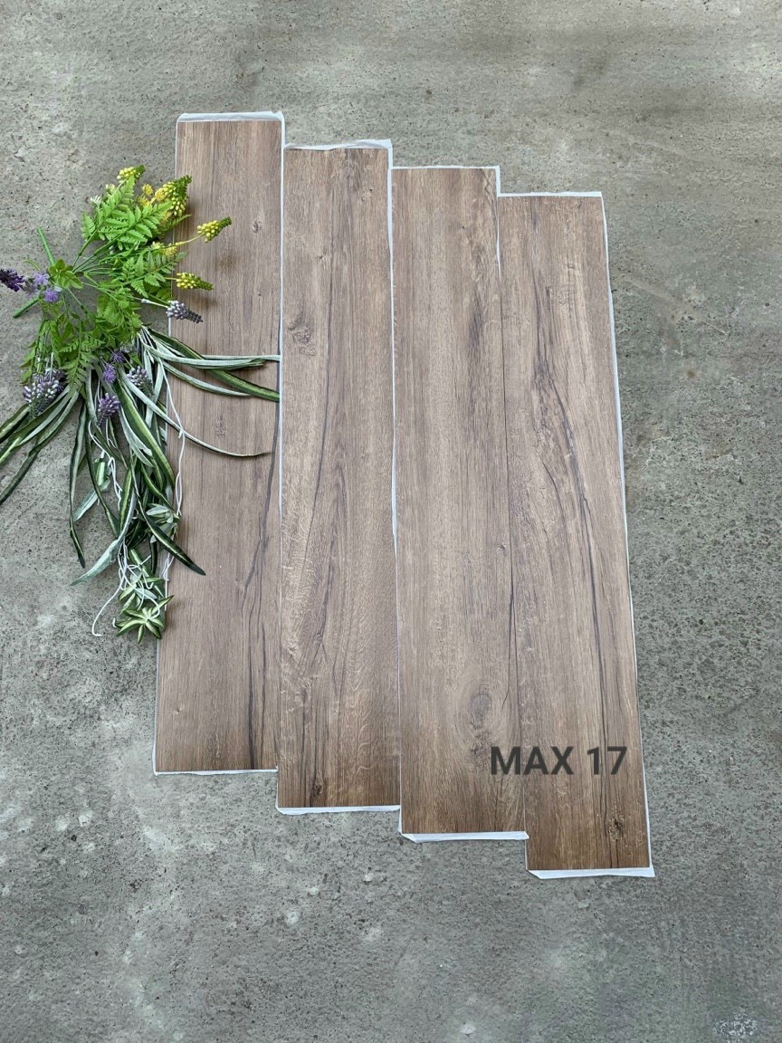 Dán sàn nhà giả gỗ. Sàn nhựa giả gỗ dán keo. miếng dán sàn  giả gỗ tự dán kích thước 91,4cmx15,8cm. . Độ dày 1,8mm (7 tấm 1 mét vuông)