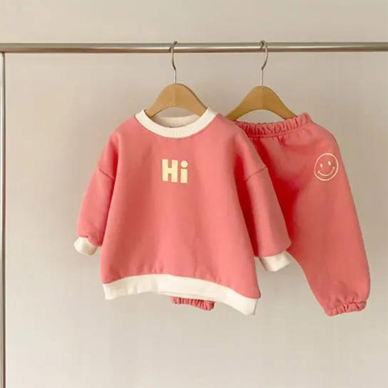 HS Children's Korean version of the suit casual sweater cartoon letters smiling face closed pants two-piece set