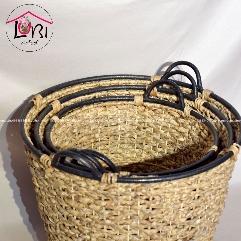 Round water hyacinth baskets with vintage iron handles