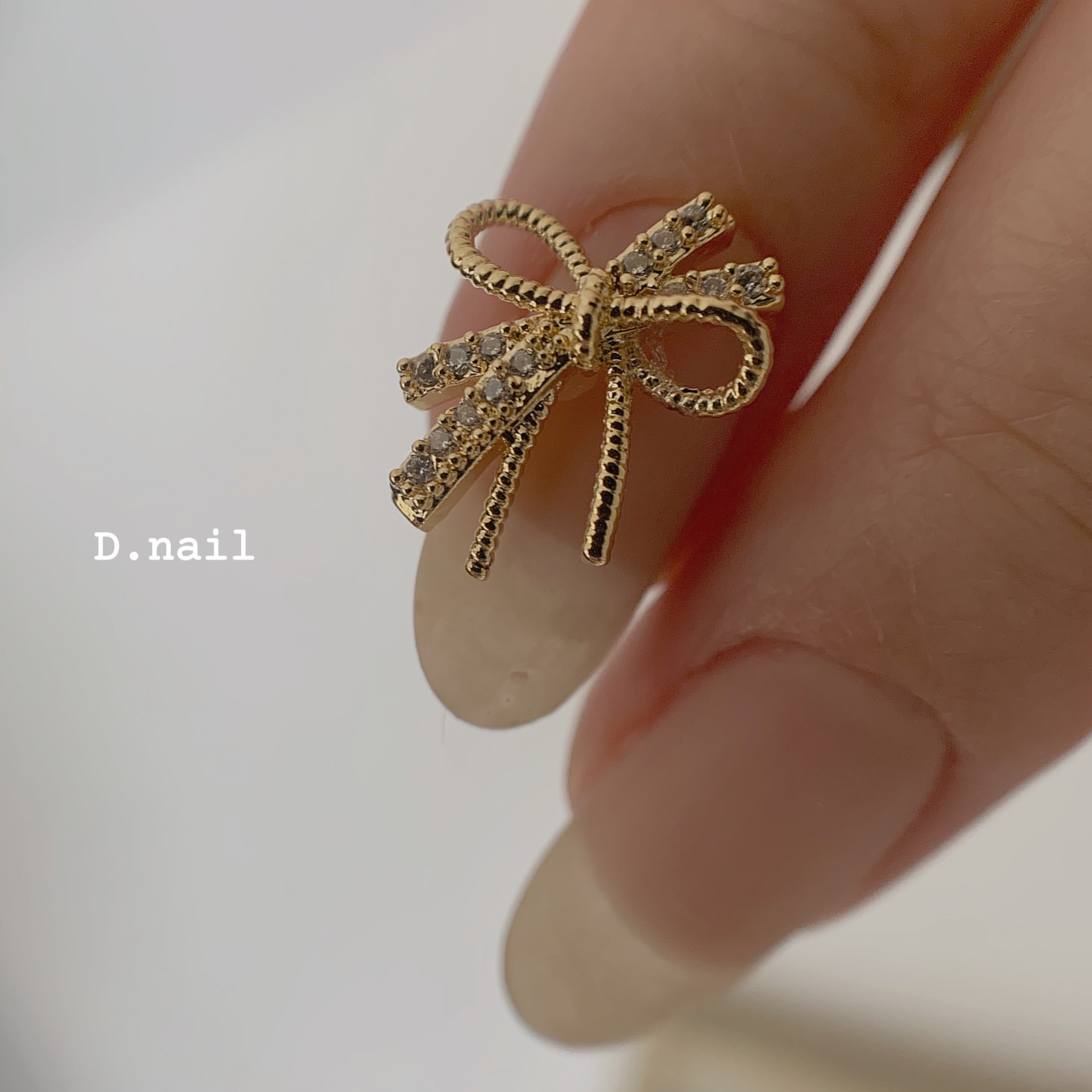 Charm Nơ  Vàng Bạc Đính Móng CN