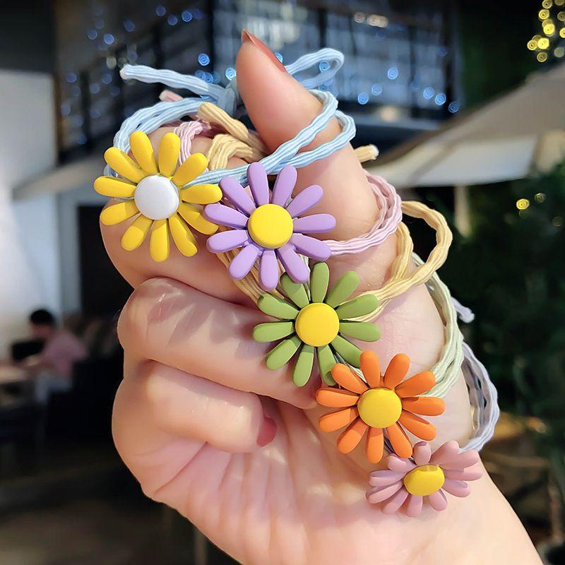 Dây buộc tóc hình hoa cúc (quà tặng)