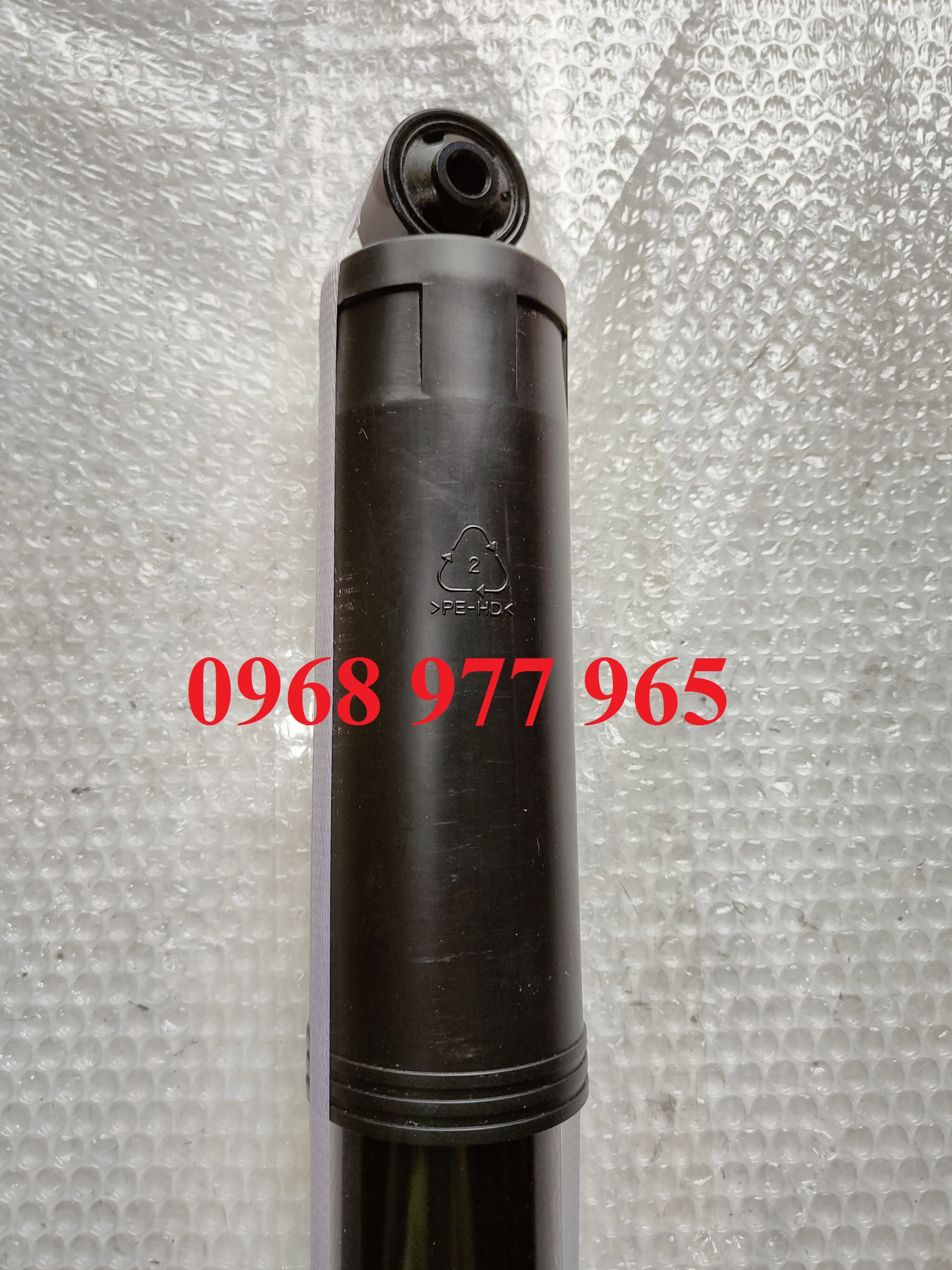 Giảm xóc sau Captiva ( Giá 1 chiếc , HQ )