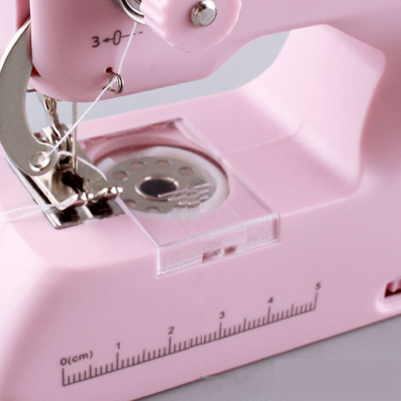 Handheld%20dual%20thread%20sewing%20machine,%20household%20electric%20small%20hand%20portable%20micro%20sewing%20locomotive%20-%20Image%207