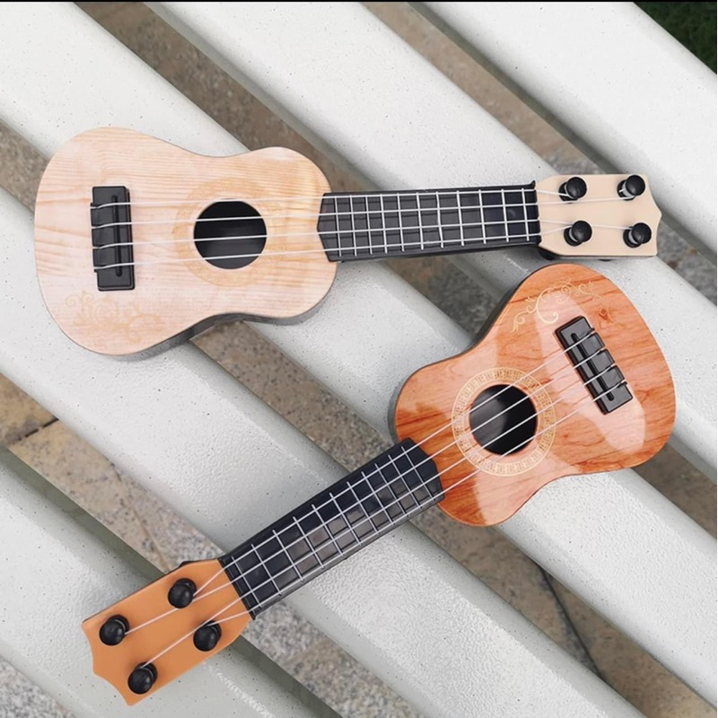 ĐÀN GITA UKULELE  ĐÁNH ĐƯỢC CHO CÁC BÉ