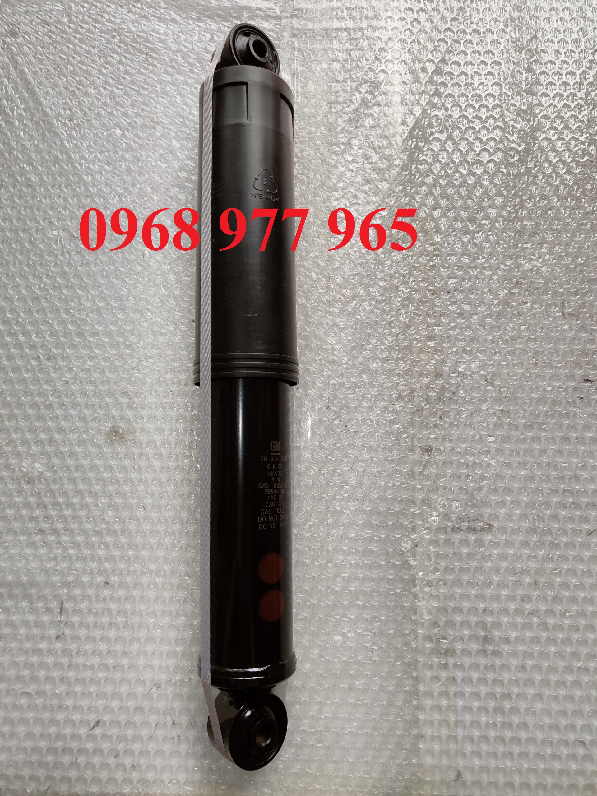 Giảm xóc sau Captiva ( Giá 1 chiếc , HQ )