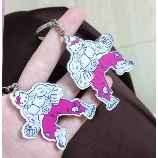 Móc khoá hello kitty đô con cơ bắp dễ thương, anime lực điền cute cặp đôi treo xe máy.